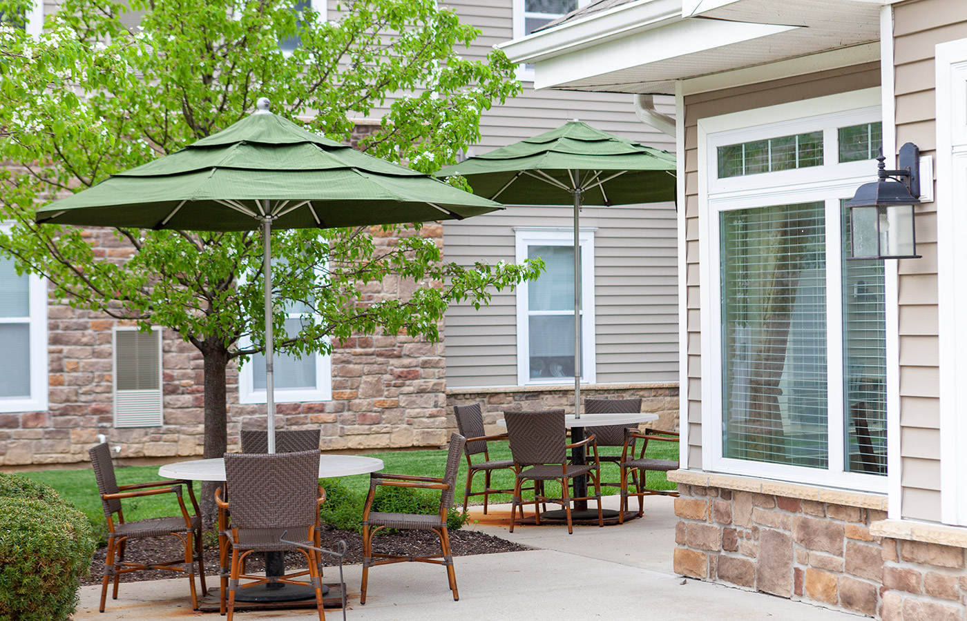 Patio table with umbrella and chairs.