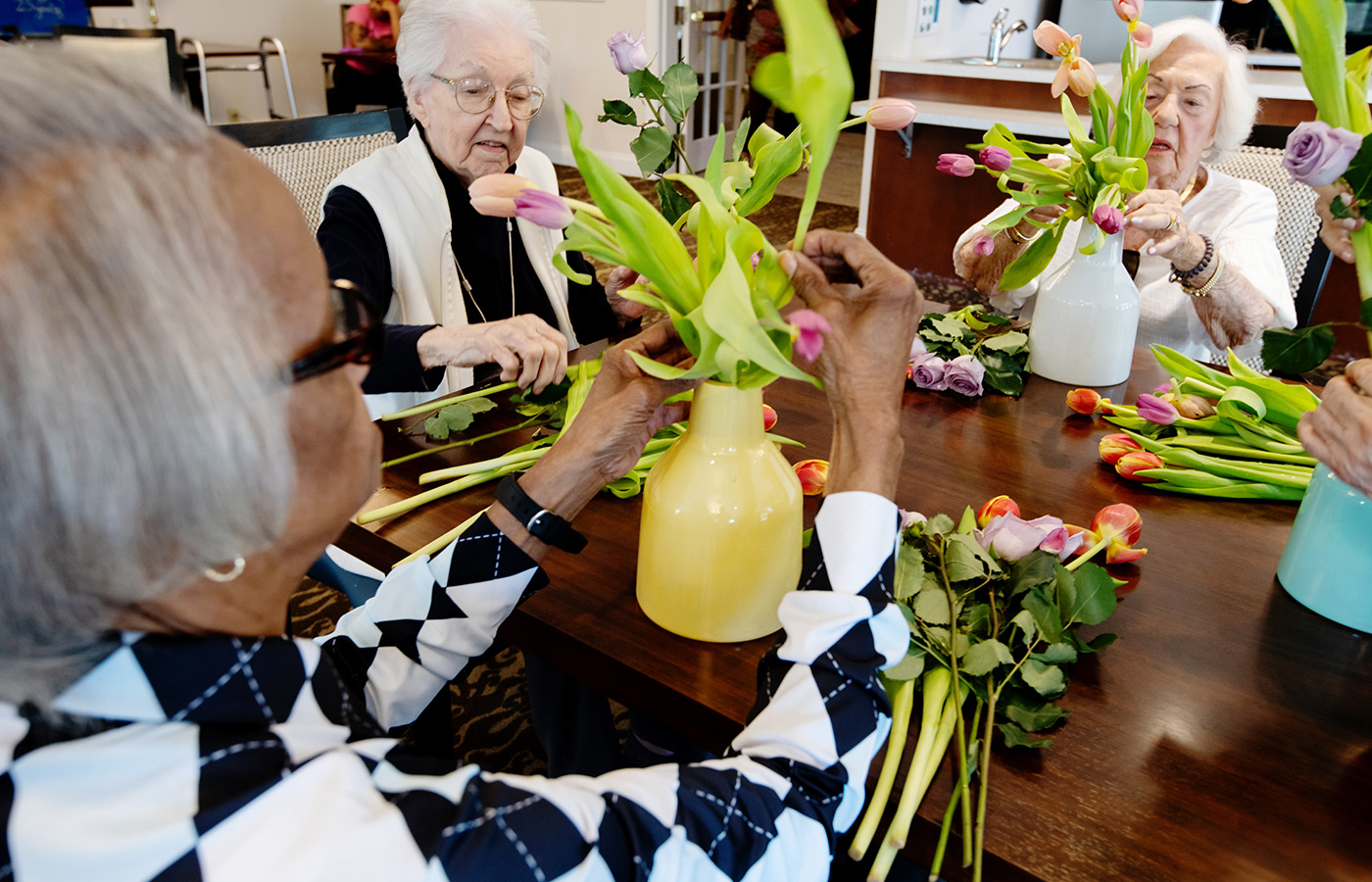 People arranging flowers.