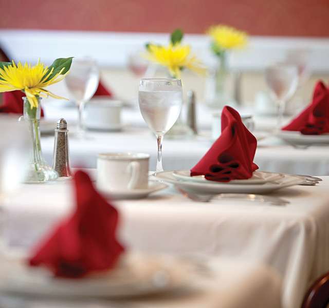 Dining room with seating area.
