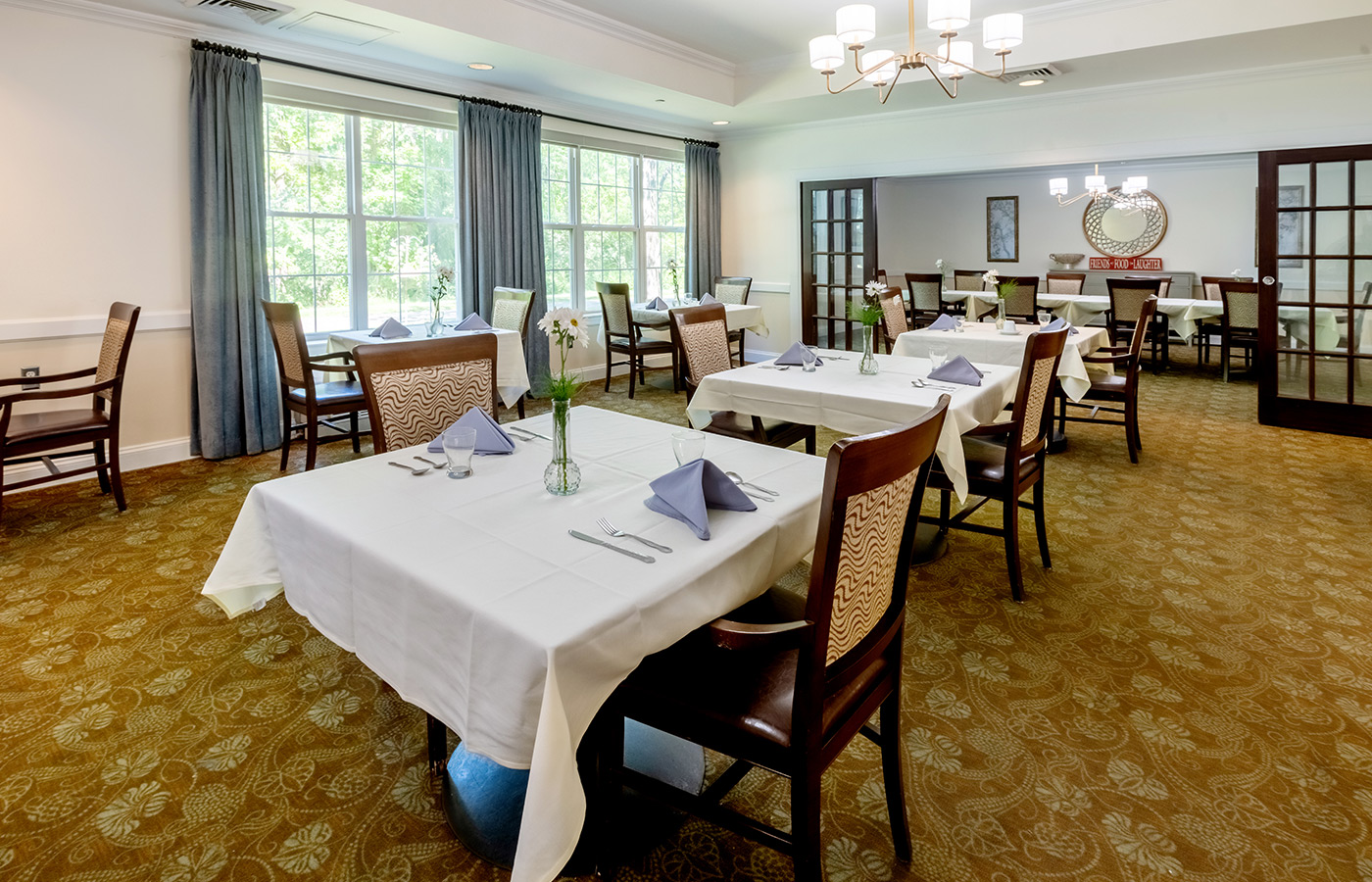 A dining room set for service.