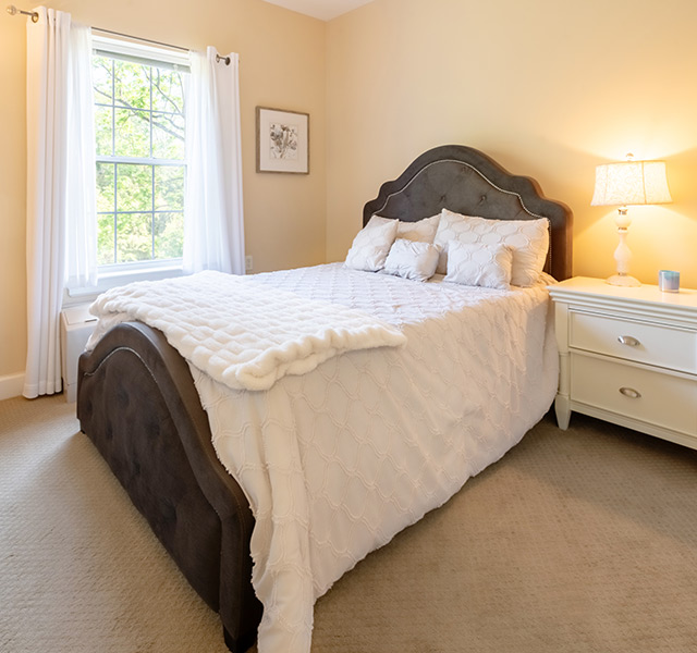 A fully furnished bedroom.