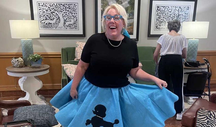 A person wearing a blue poodle skirt.