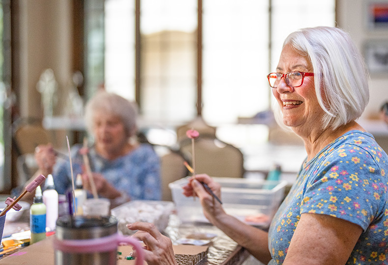 Residents enjoying an art class.