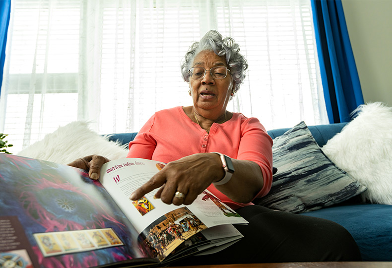 A person looking at a book.