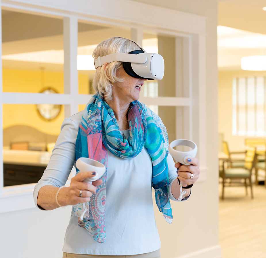 A resident playing with a VR headset.