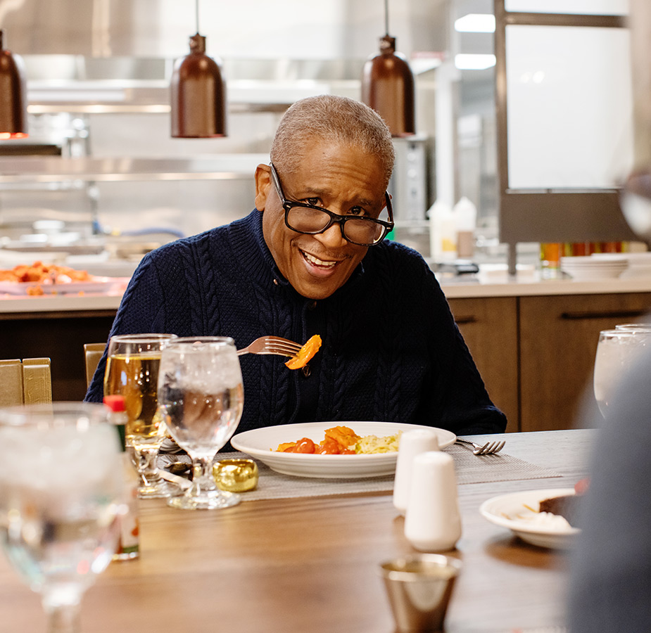 A resident eating lunch.