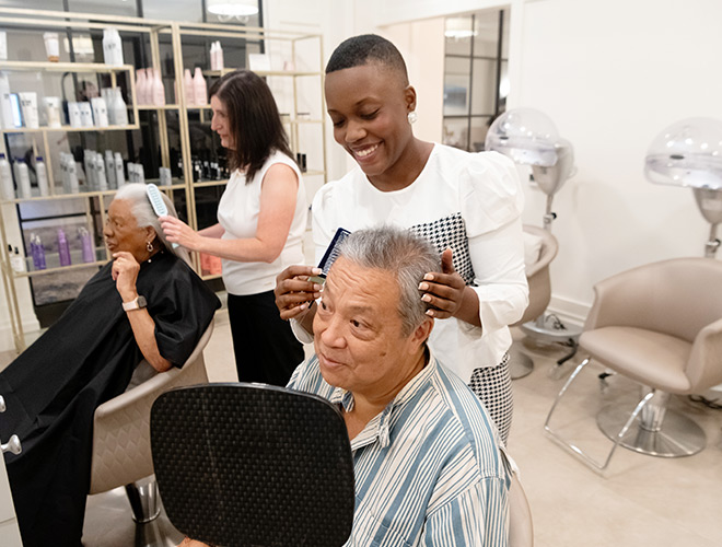 A person getting their hair done.