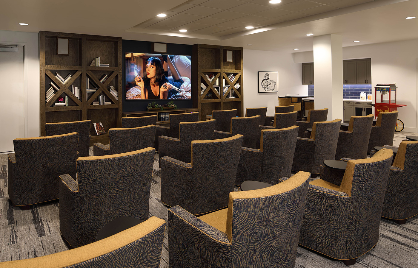 A theater with large comfy chairs.