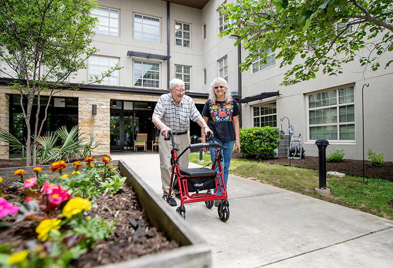 A resident walking in the garden.