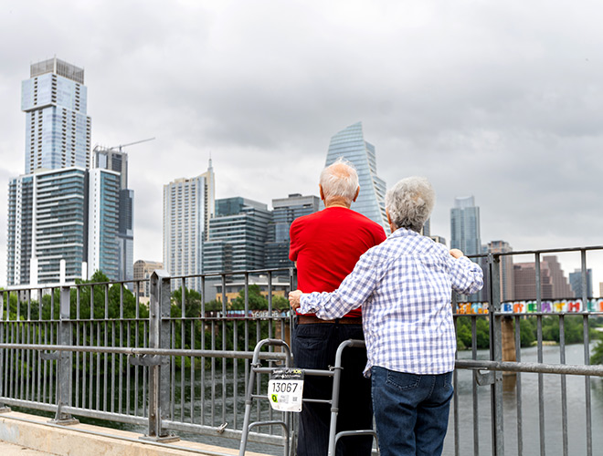 A couple looking out at the city.