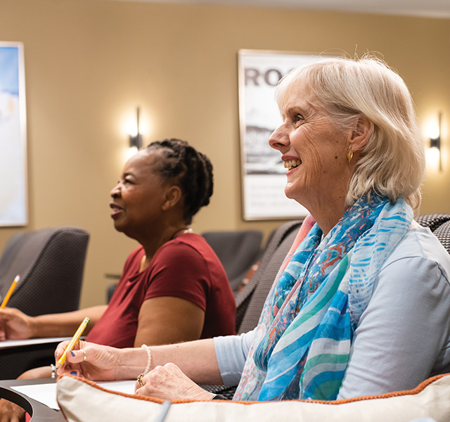 People taking notes.