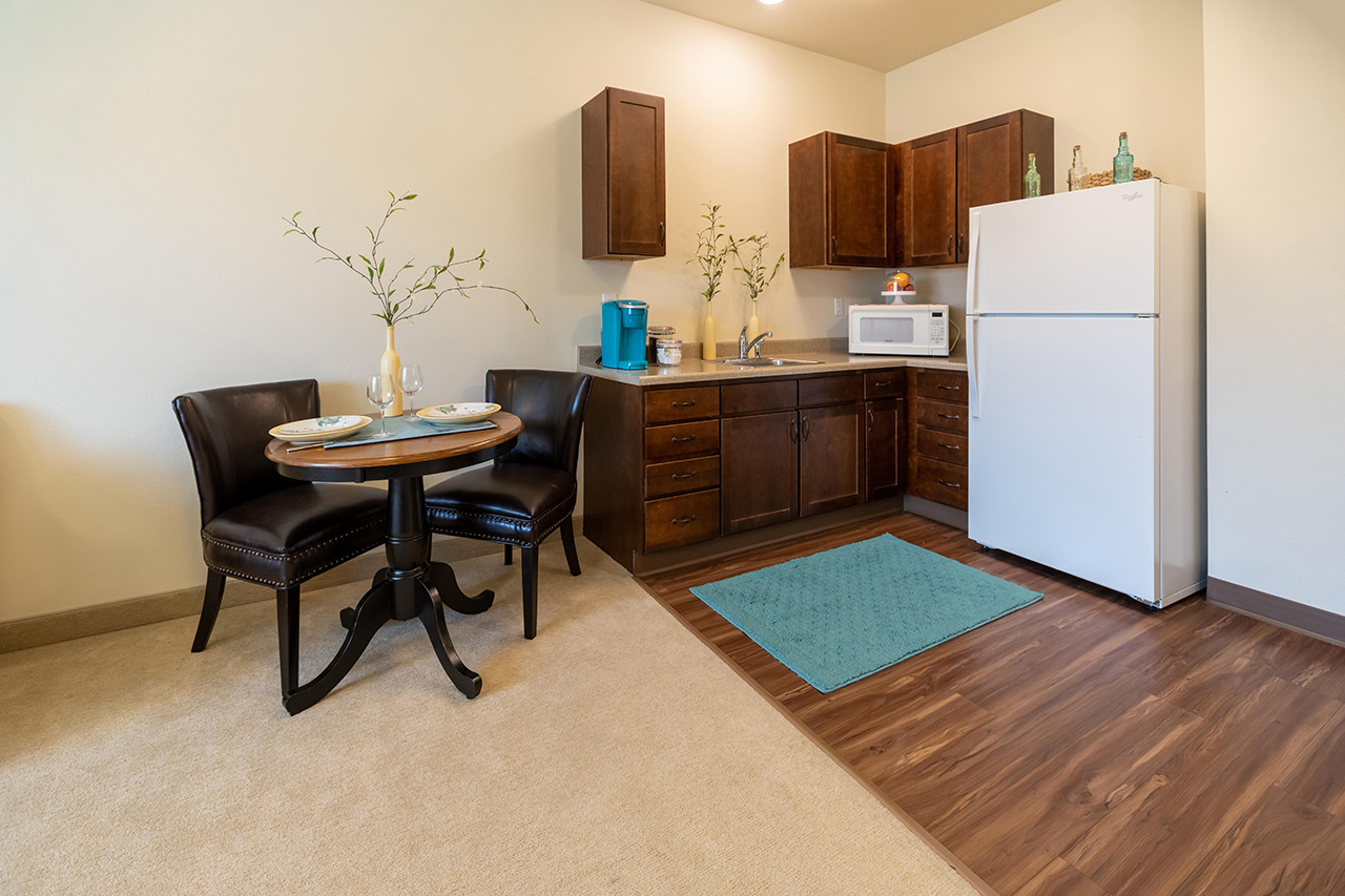 A kitchen in an apartment at Summit Senior Living.