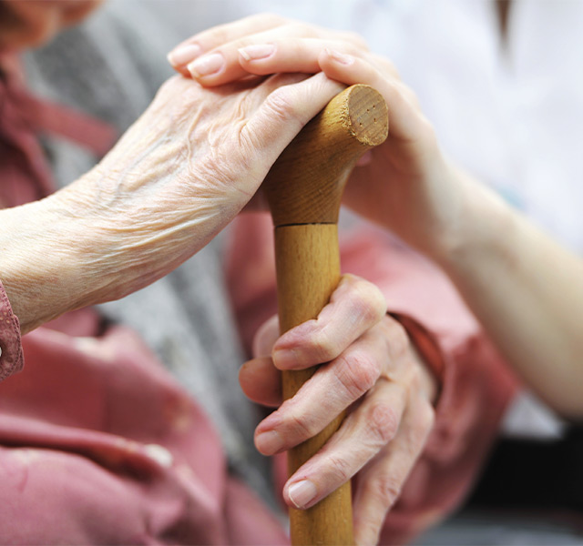 Two people holding hands.