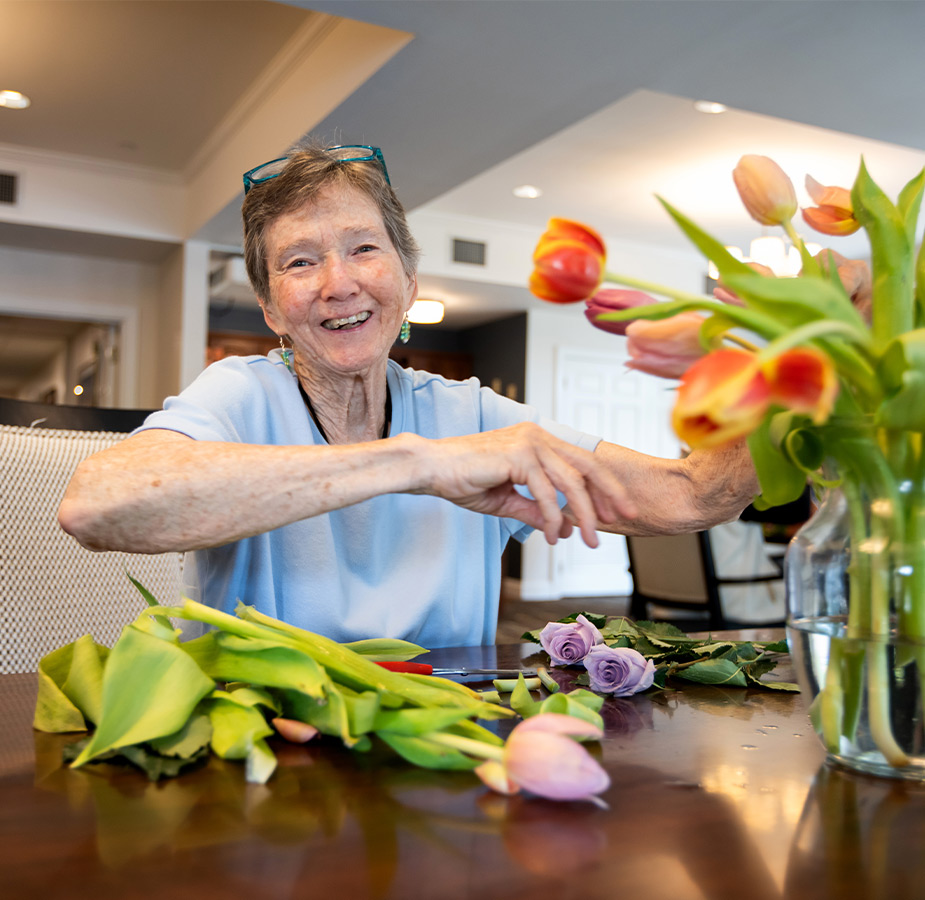 A person arranging flowers.
