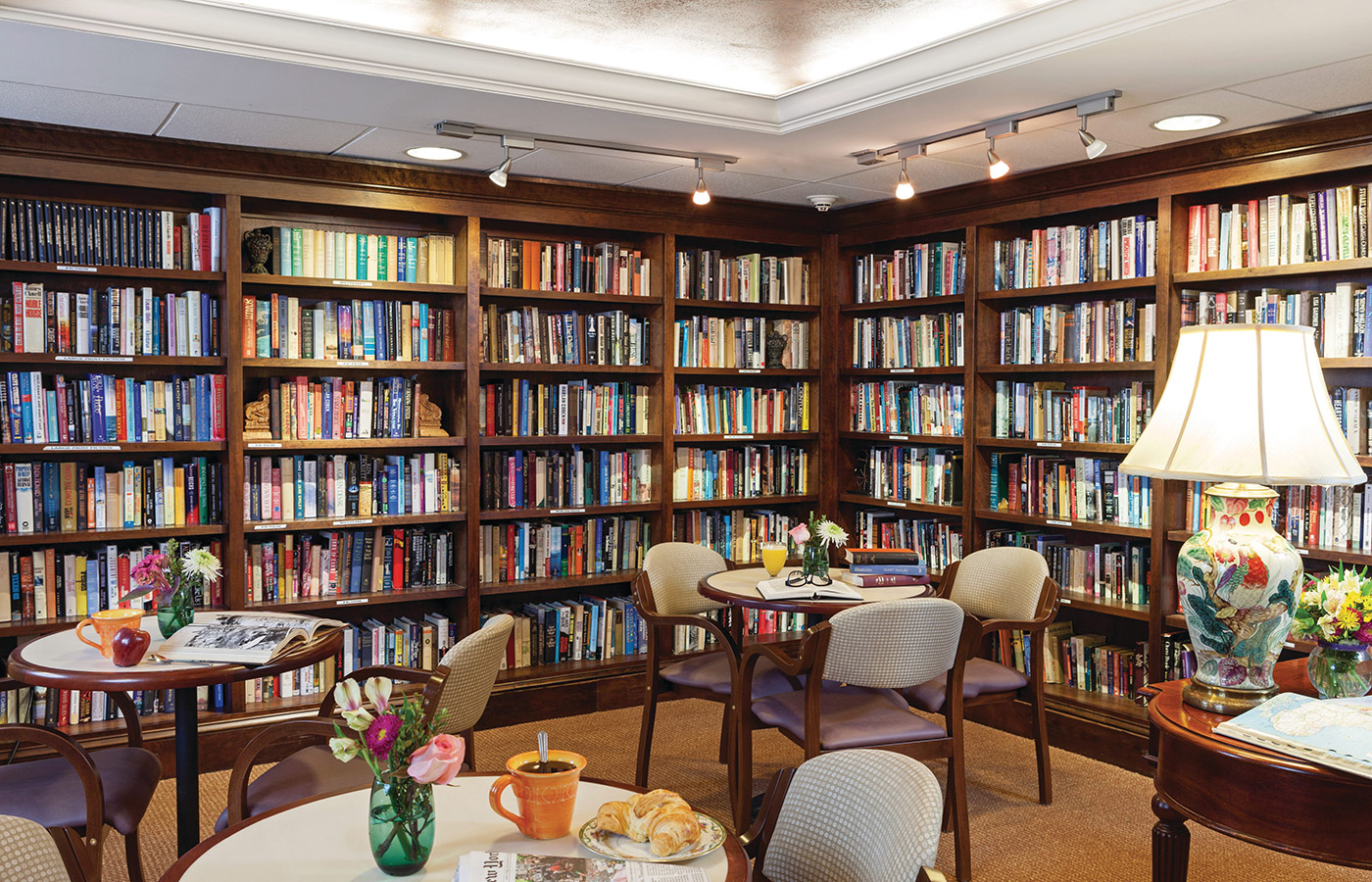 Library room filled with books and seating area.