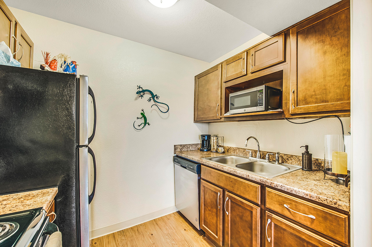 A kitchen in an apartment at The Fountains at La Cholla.