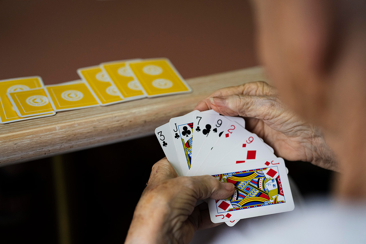 A person is playing cards.