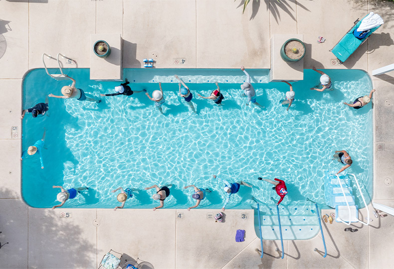 A group of people in the pool.