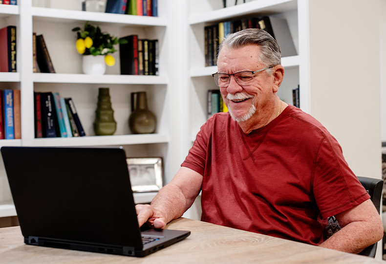 A person on the computer.