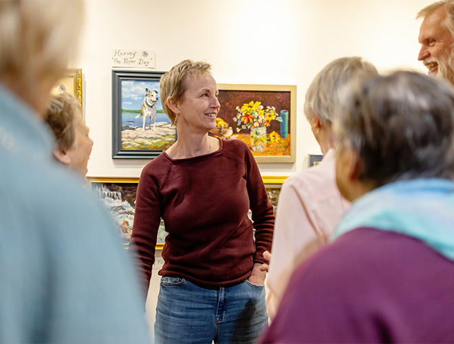 A person talking with others.