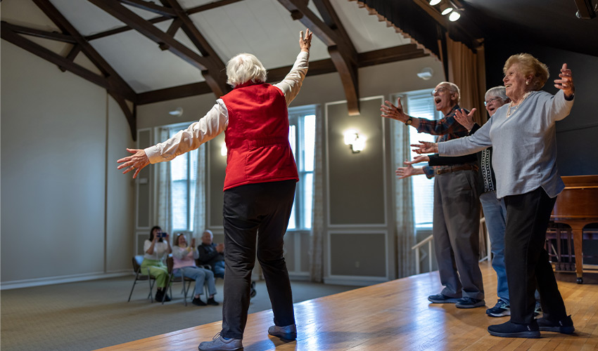 People on a theater stage.