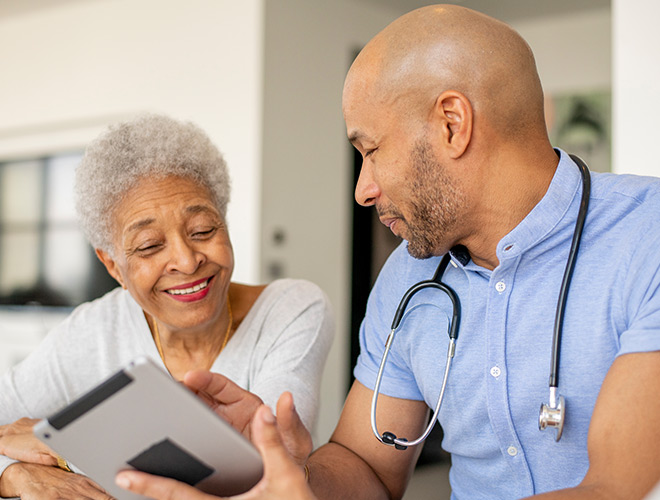 A resident with their nurse.