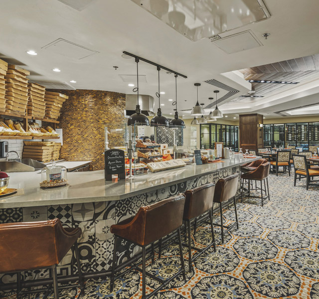 Dining room with seating area.