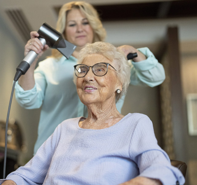 Resident getting hair done at the salon.