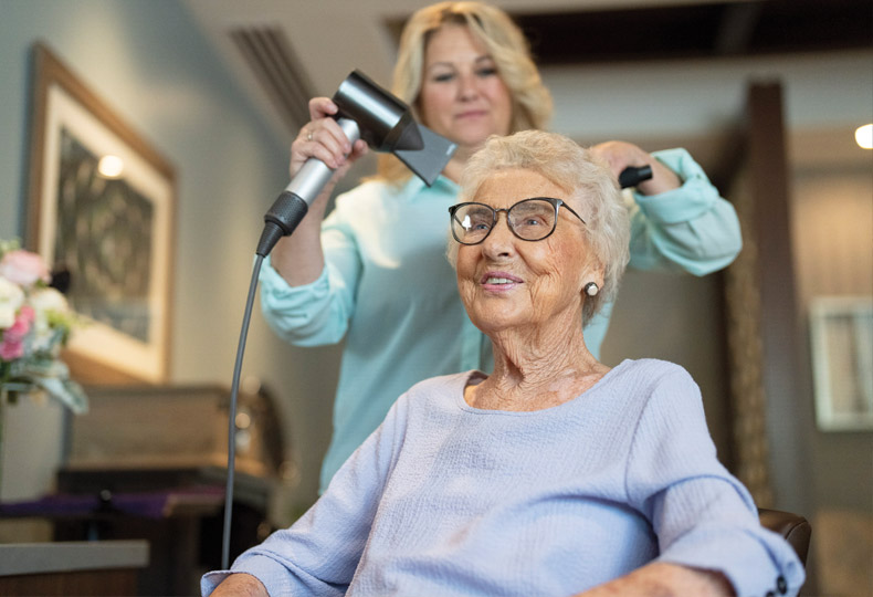 Resident getting hair done at the salon.