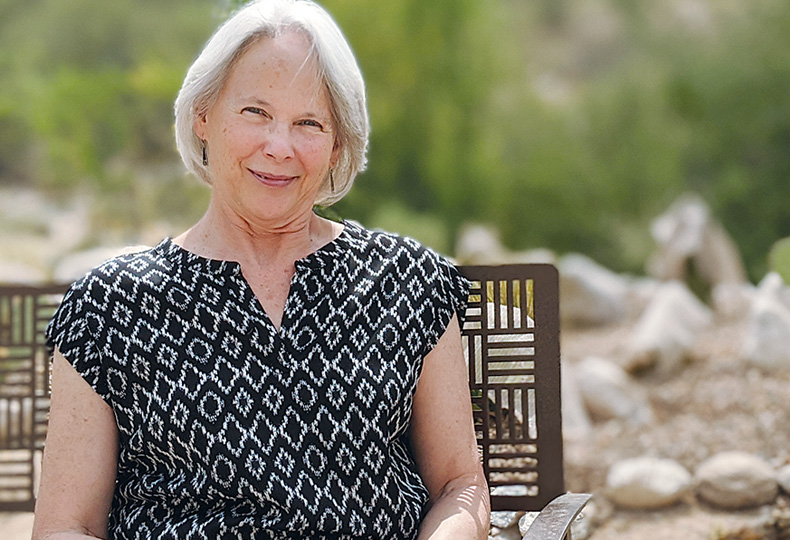 A resident is sitting outside.