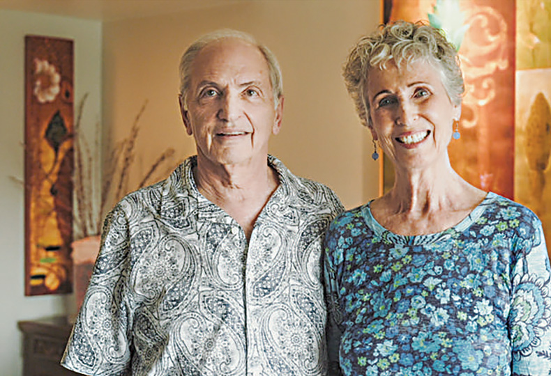 Two residents are smiling at The Hacienda at the Canyon.