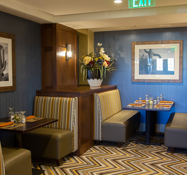 Dining room with seating area.