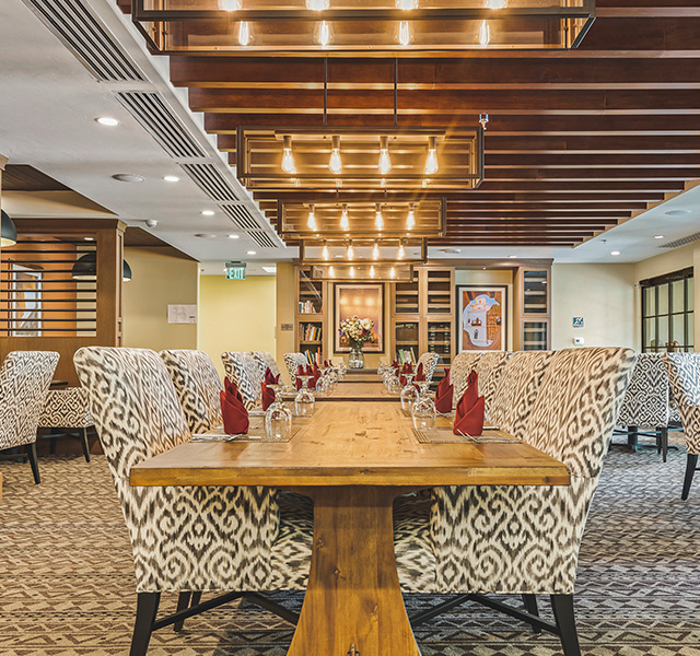 Dining room with seating area.