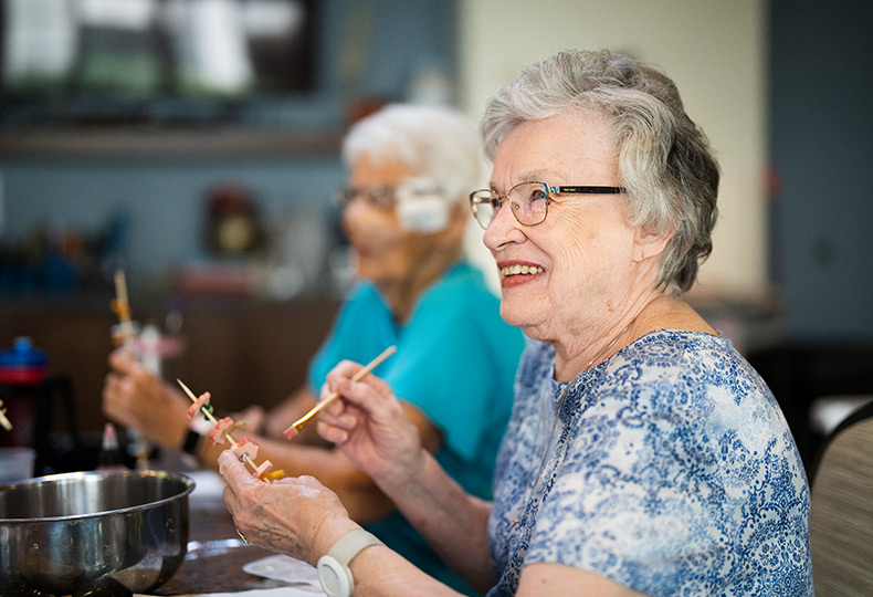 Residents enjoying an art class.