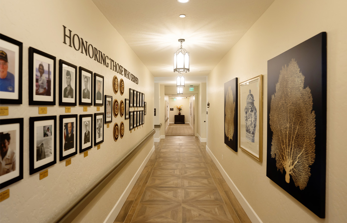A hallway with photos of veterans on the wall.