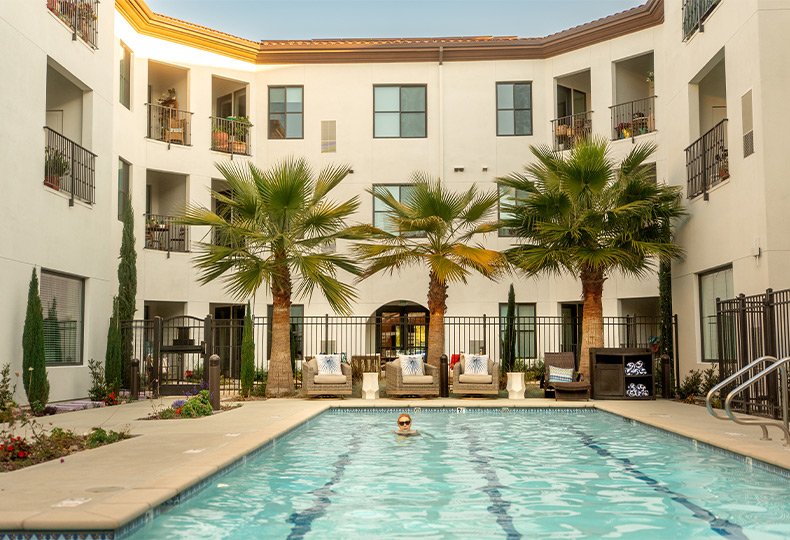 A person swimming in the pool.