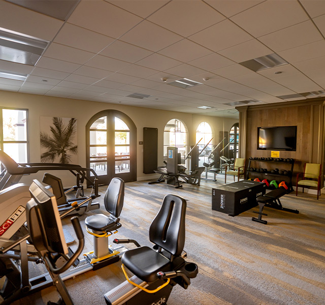 A fitness center with equipment.