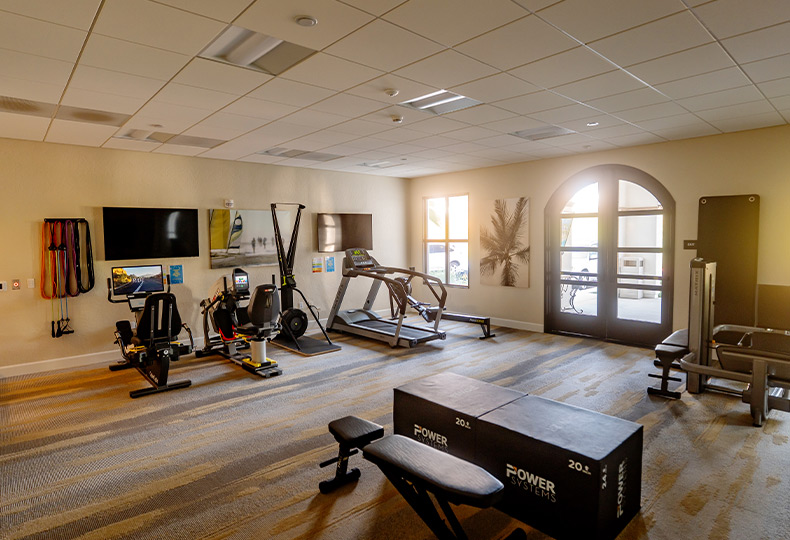 A fitness center with equipment.