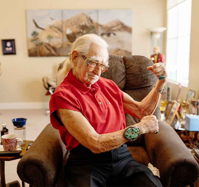 A person flexing their muscles.