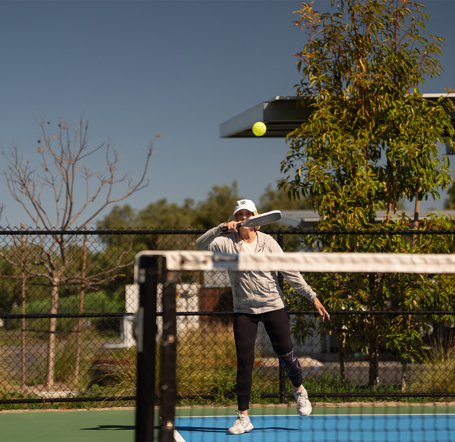 A person playing pickleball.
