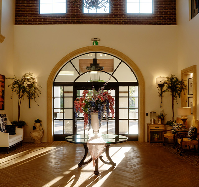 An entrance door with light shining through.
