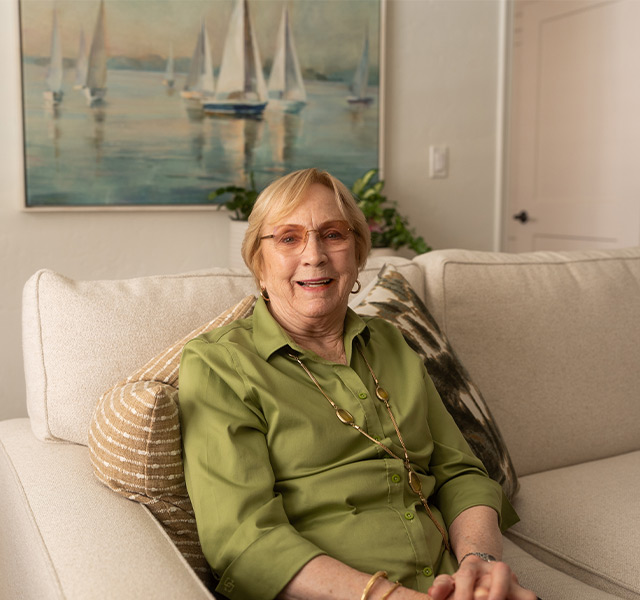 A person sitting on the couch.