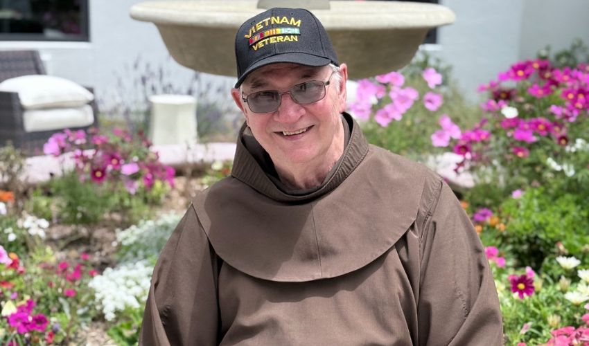 A resident and veteran wearing his Vietnam hat.