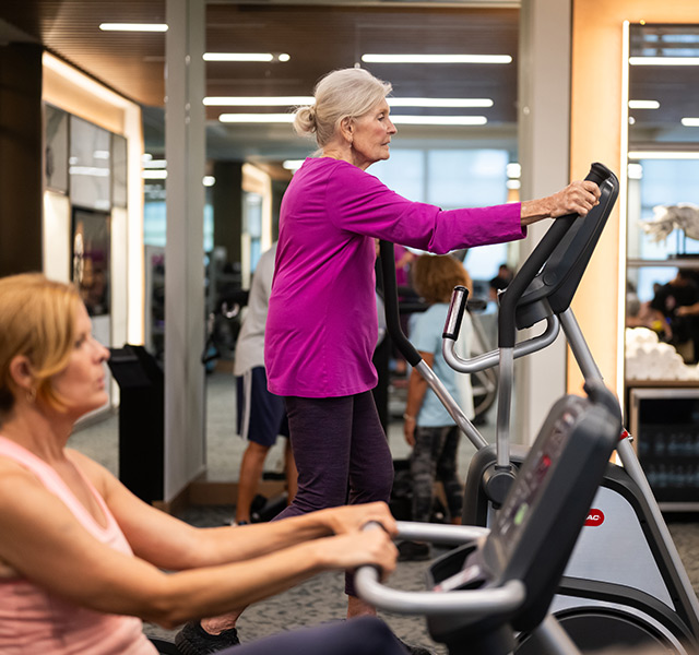 Residents working out at the gym.