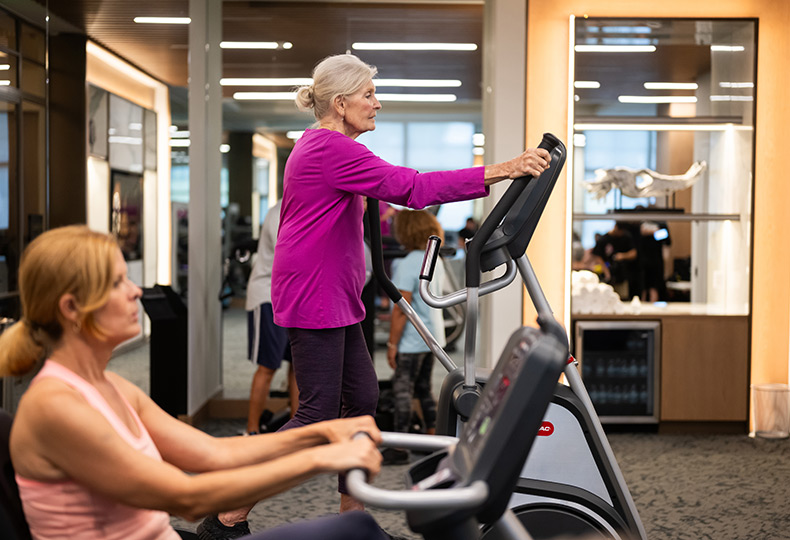 Residents working out in the gym.
