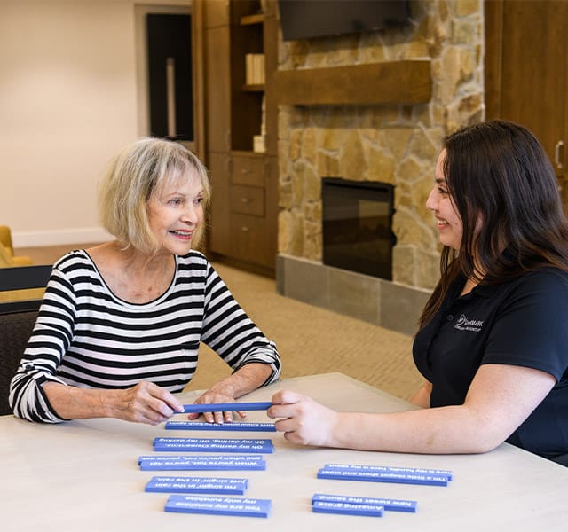 Two residents enjoying a game of scrabble. 