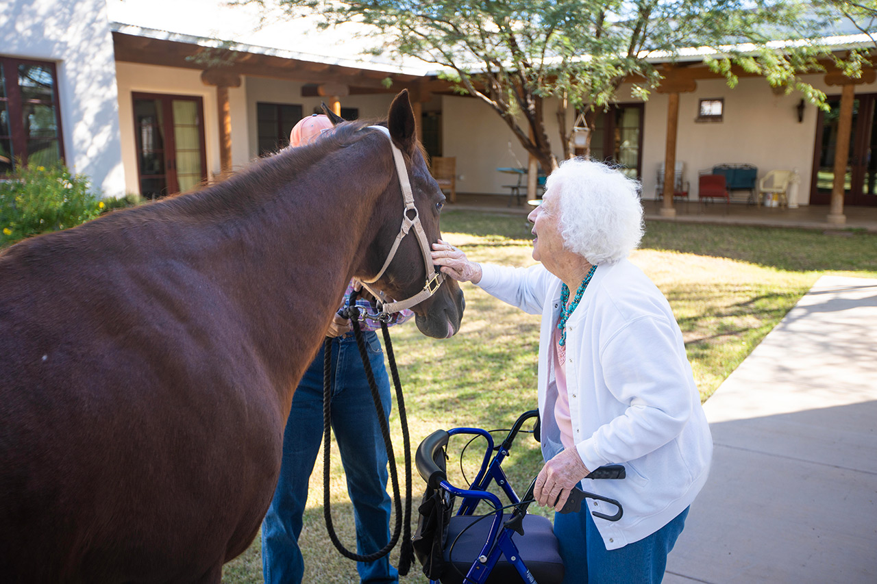 Resident with a horse.