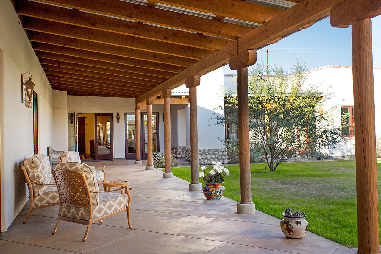 Seating area under the porch.