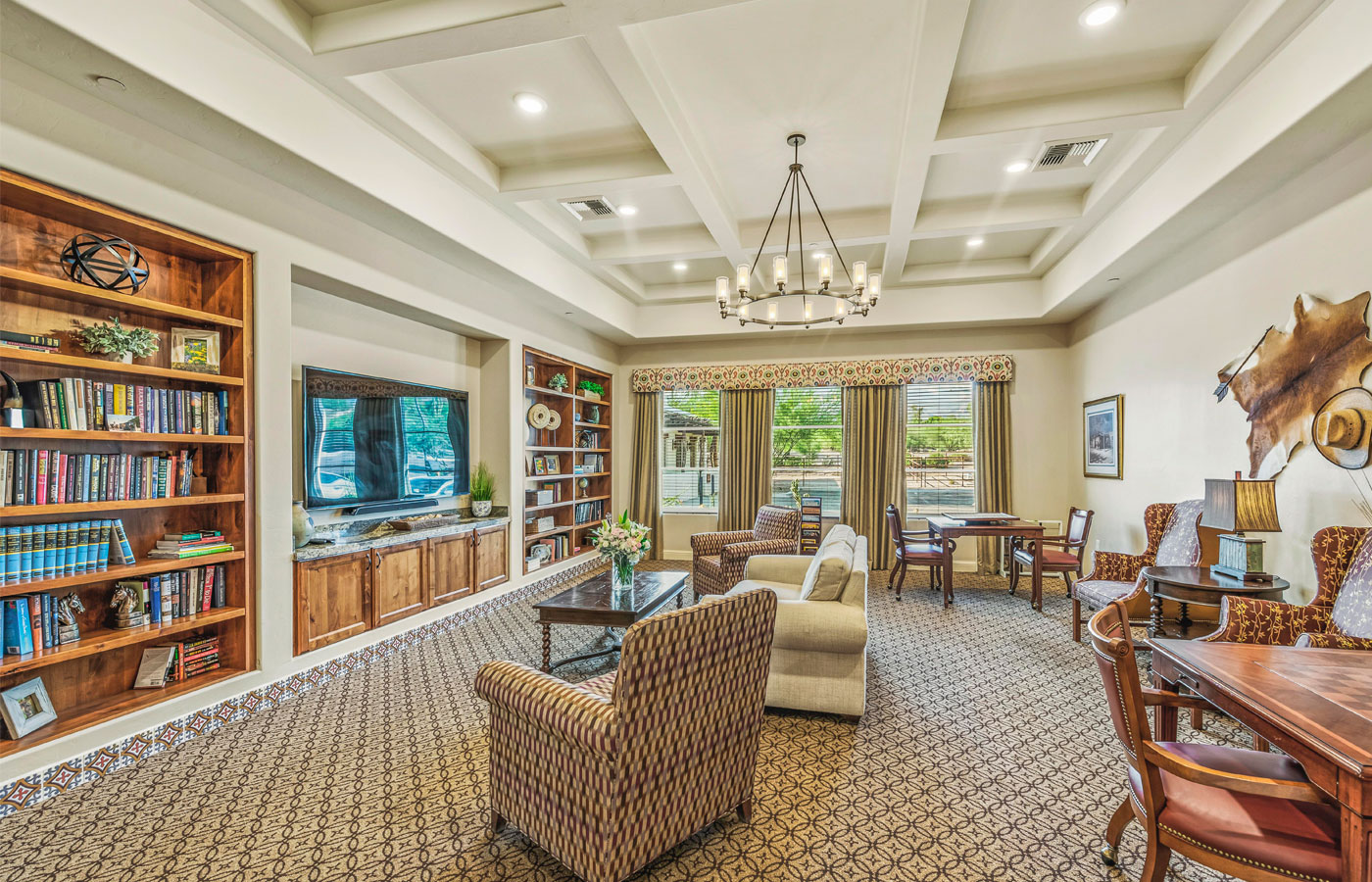 Library filled with books and seating area.