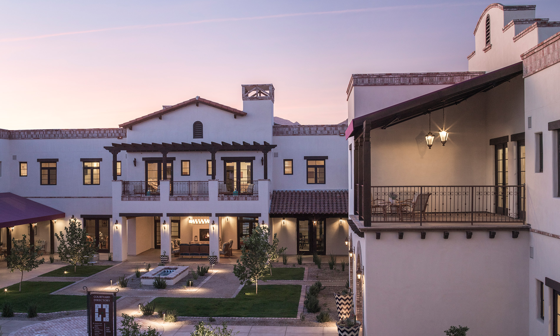 The Hacienda at the River exterior building and courtyard.